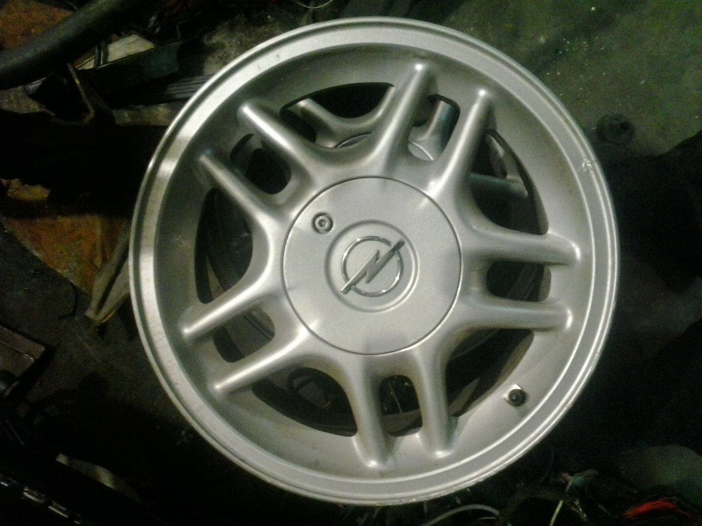 Оригінальний ковпачок для дисків Opel 90575774