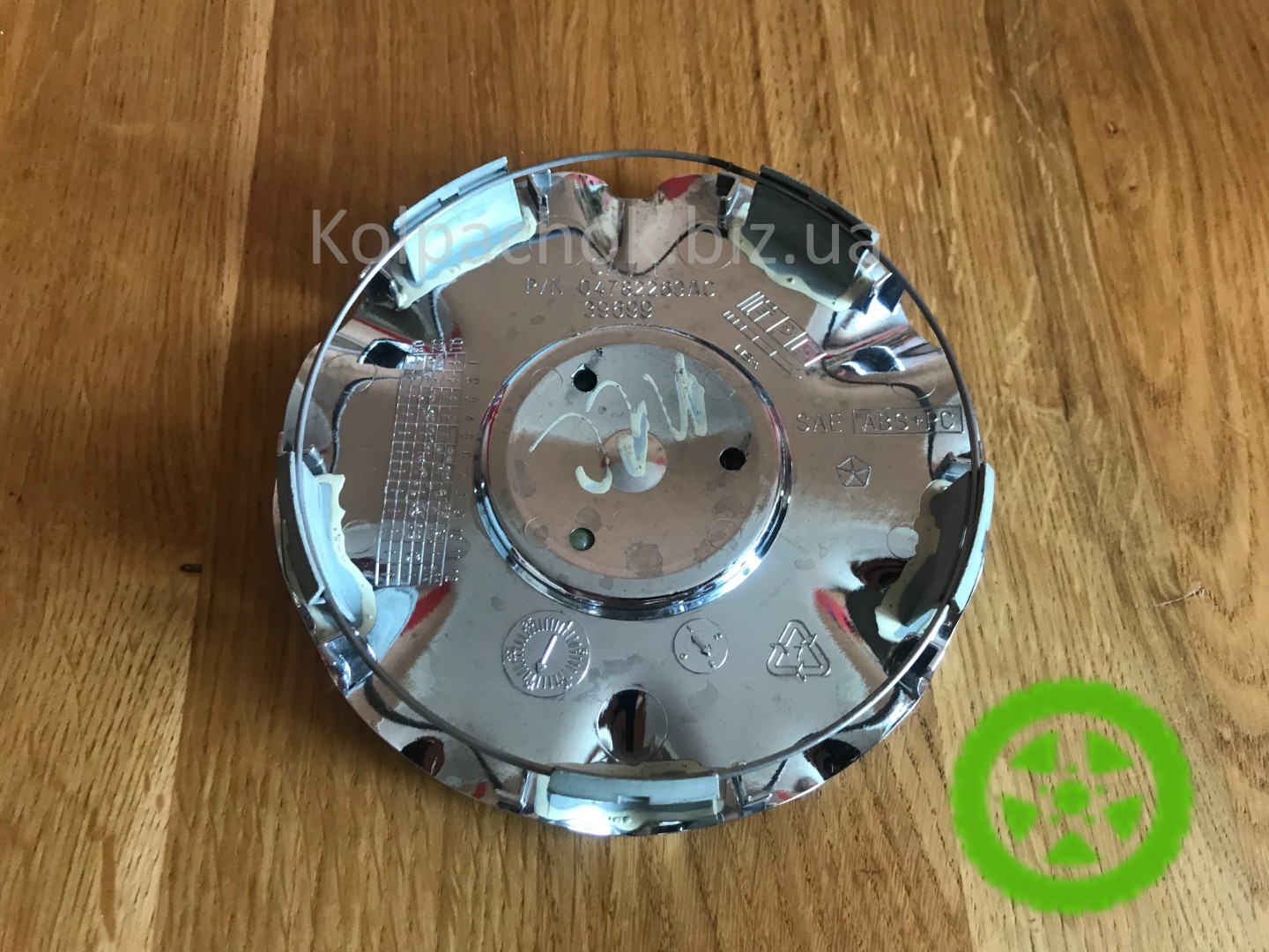 Original center caps for alloy wheels Chrysler Sebring 04782269AC