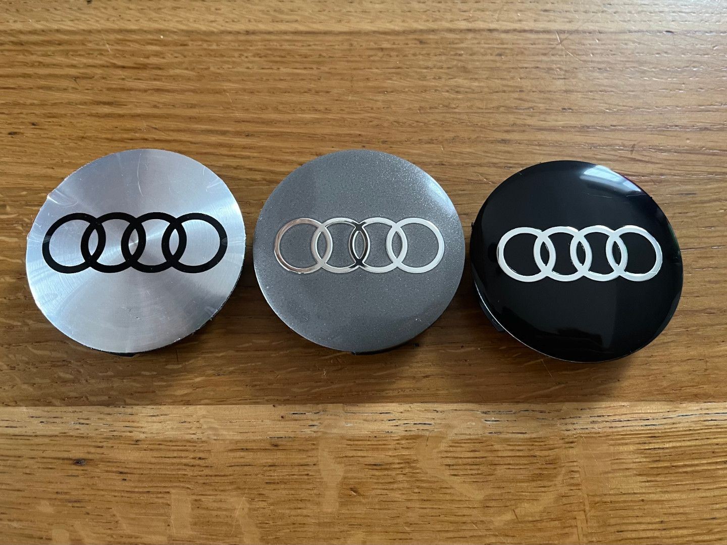 The center caps with Audi logo for Borbet 74404 wheels