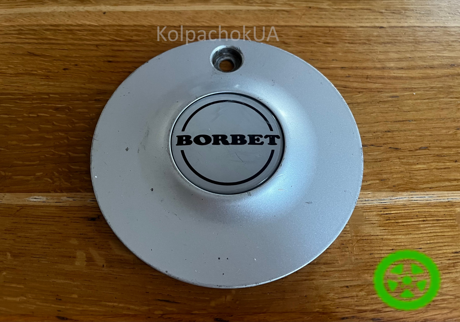 Оригінальний ковпачок для дисків Ford H94SX1009AA
