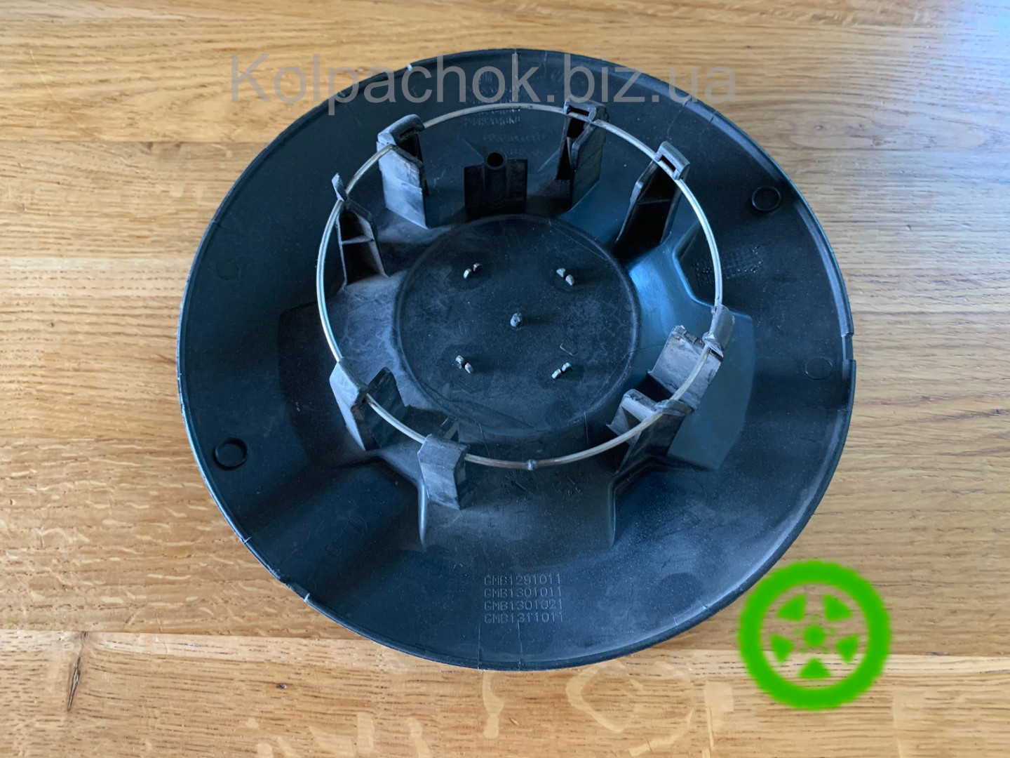Wheel center  caps Opel Combo 24432643