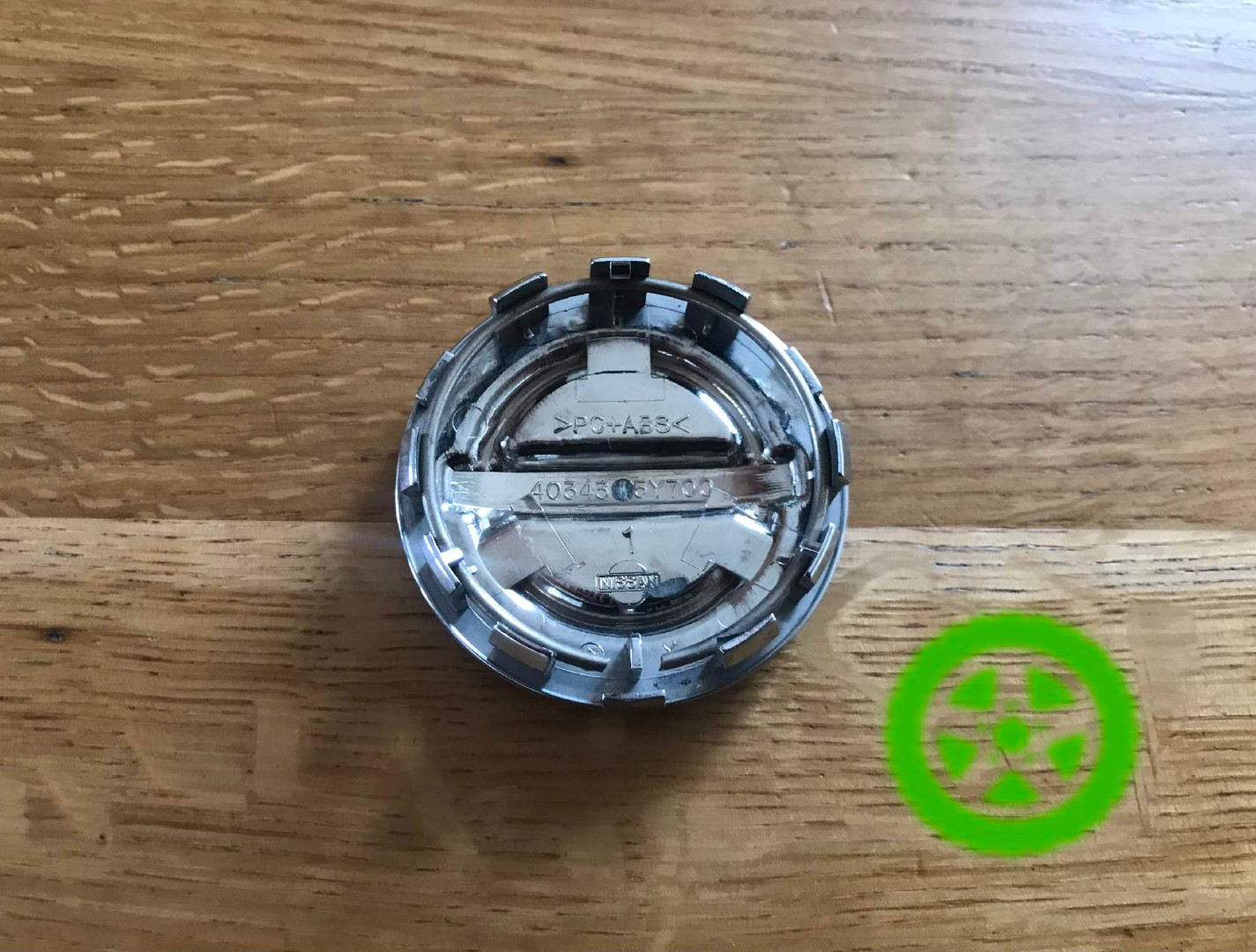 Оригінальний ковпачок для дисків Nissan 40343-5Y700