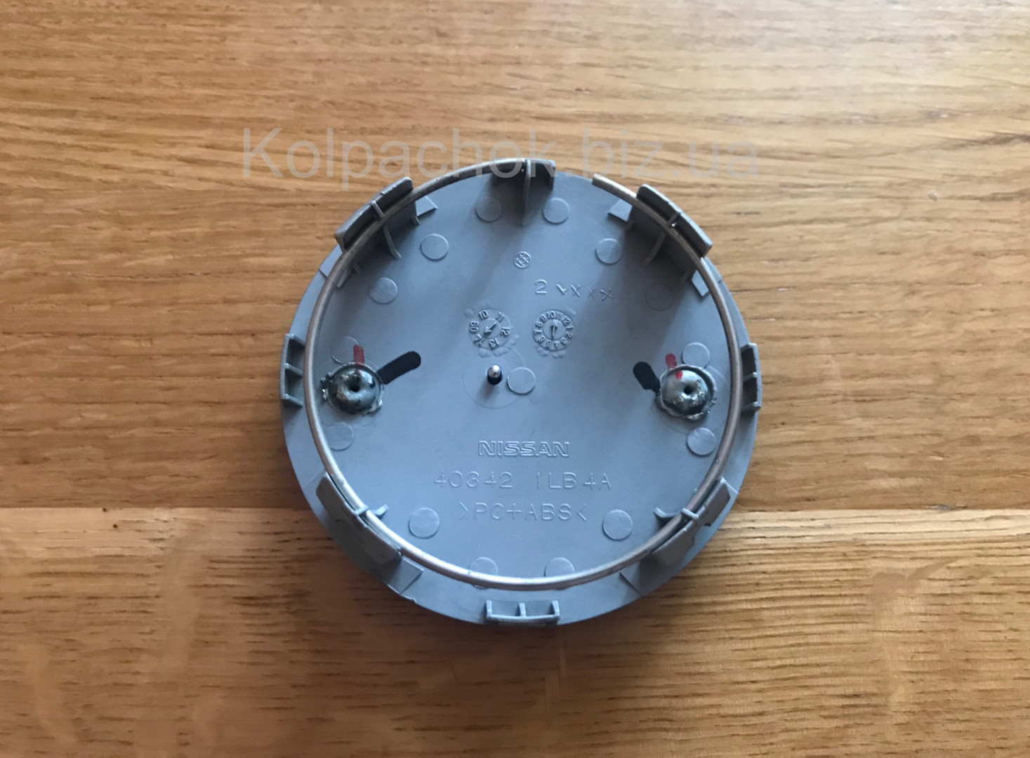 Оригінальний ковпачок на диски Infiniti 40342-1LB4A