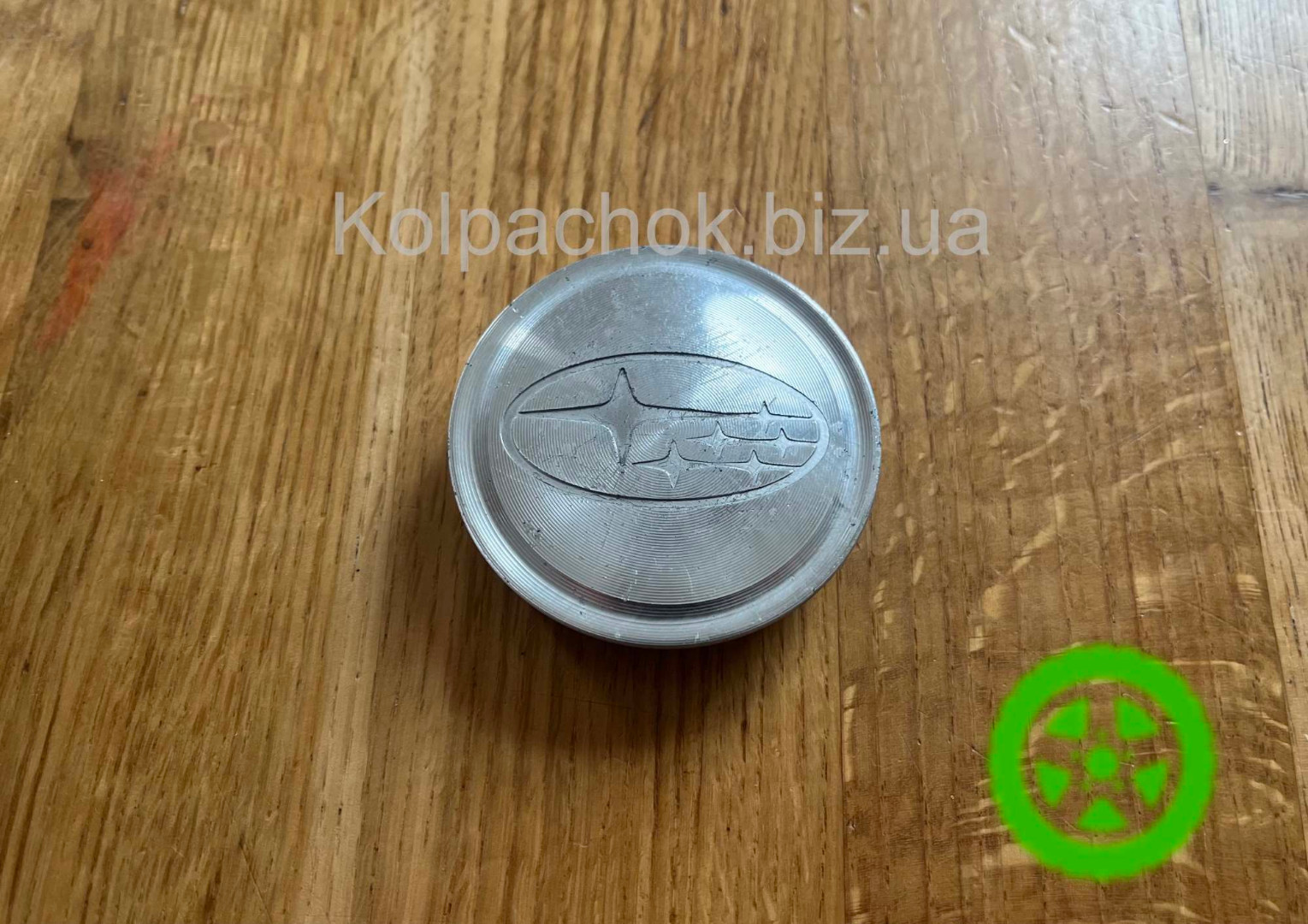 Оригинальный колпачок на диски Subaru 28821SA040