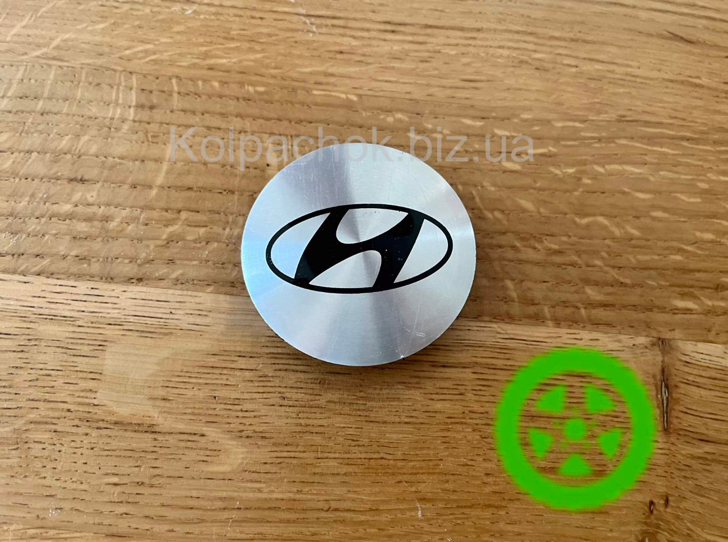 The center caps with Hyundai logo for rims Borbet 74404