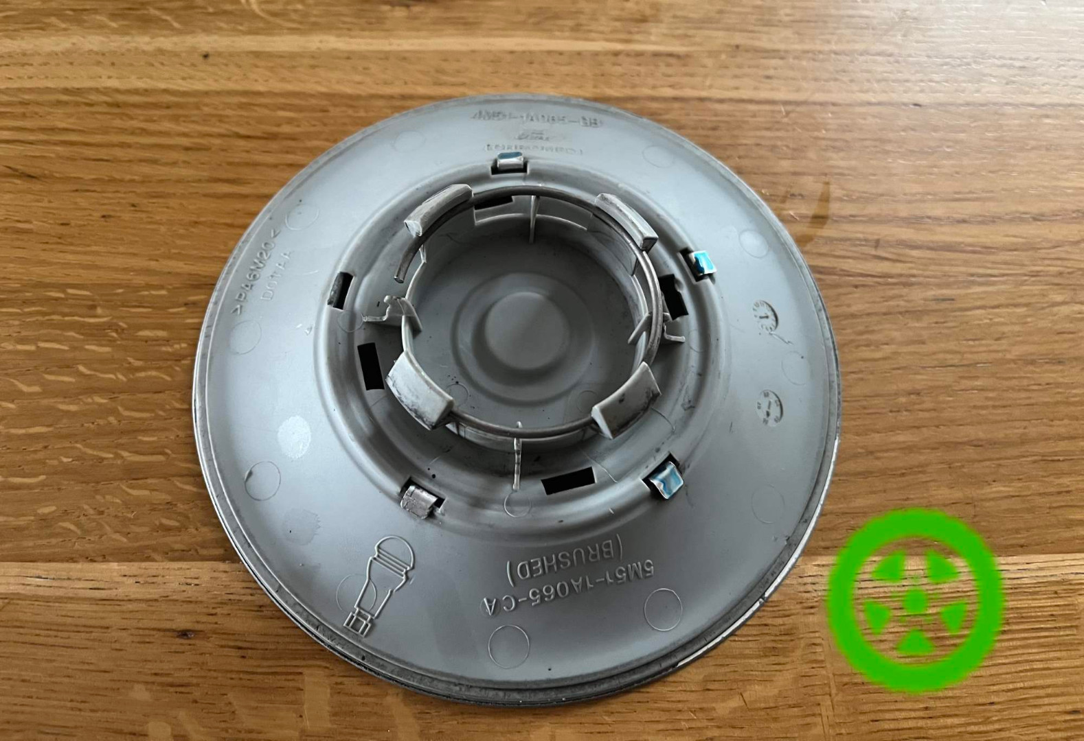 Оригінальний ковпачок для дискі Ford  4M511A065GB 1317880