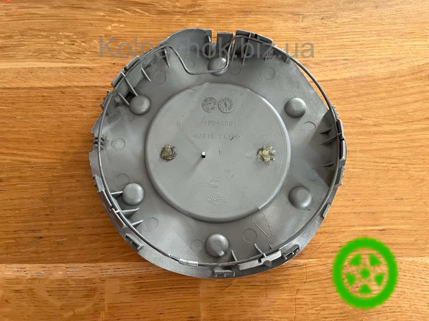 Оригинальный колпачок на диски Nissan 40315-CA100