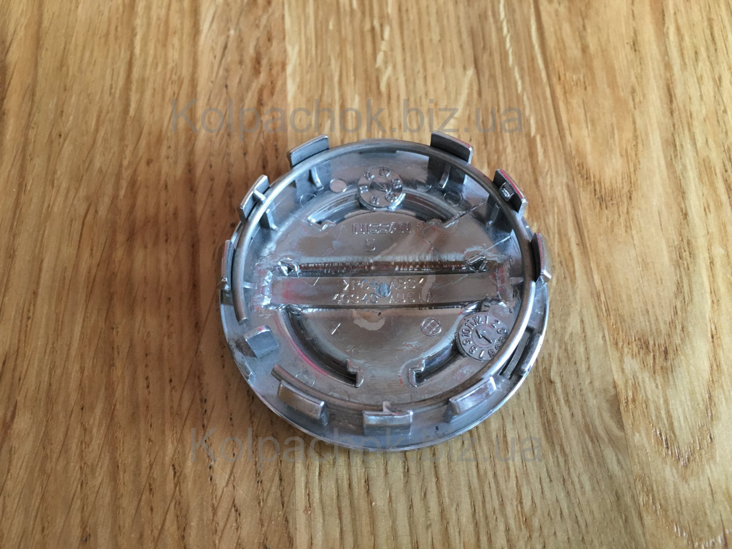 Wheel center caps Nissan 40343AU51A (original)