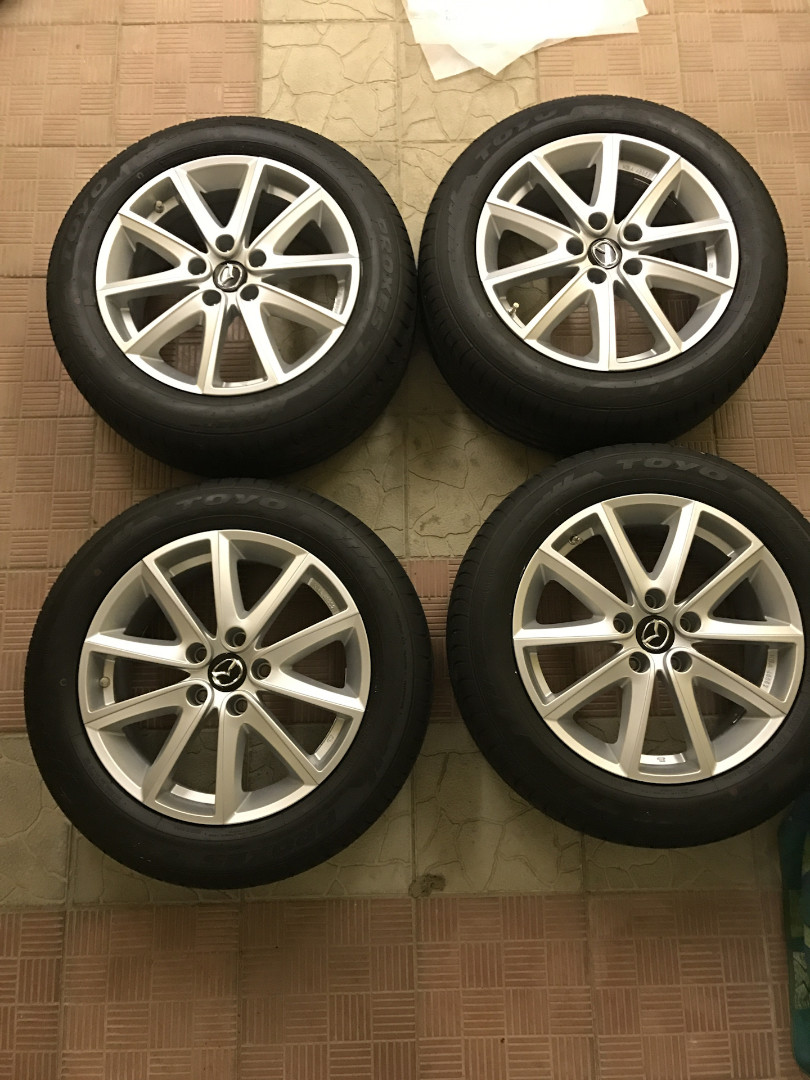 Оригінальний ковпачок для дисків Mazda C831V3815