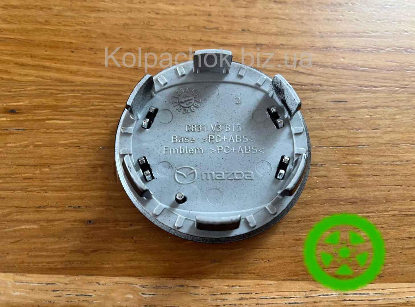 Оригінальний ковпачок для дисків Mazda C831V3815