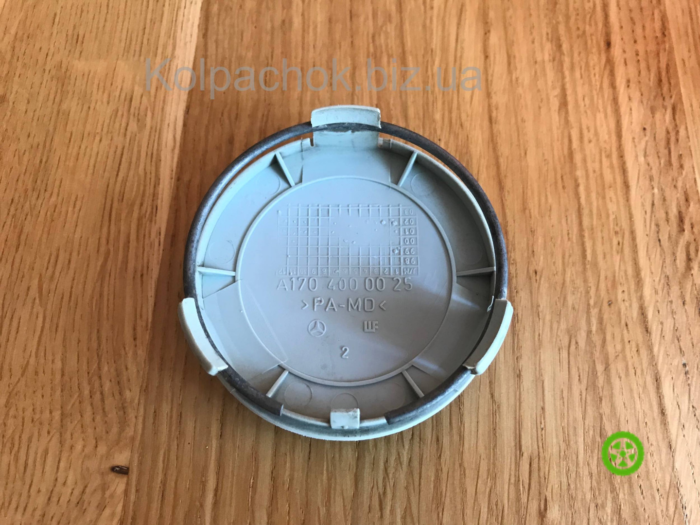 Оригінальний ковпачок для дисків Mercedes A1704000025