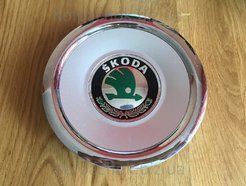Wheel center caps Skoda 1U0601149R (оригинал)