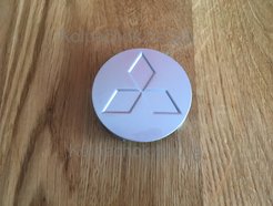 Оригинальный колпачок на  диски Mitsubishi MR455633