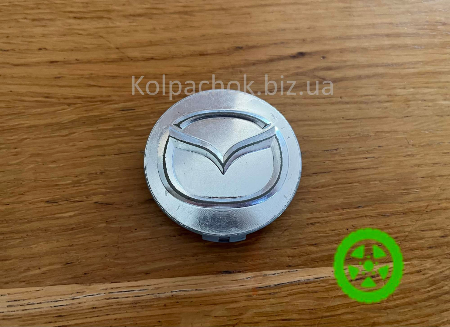 Оригинальный колпачок на диски Mazda 2114