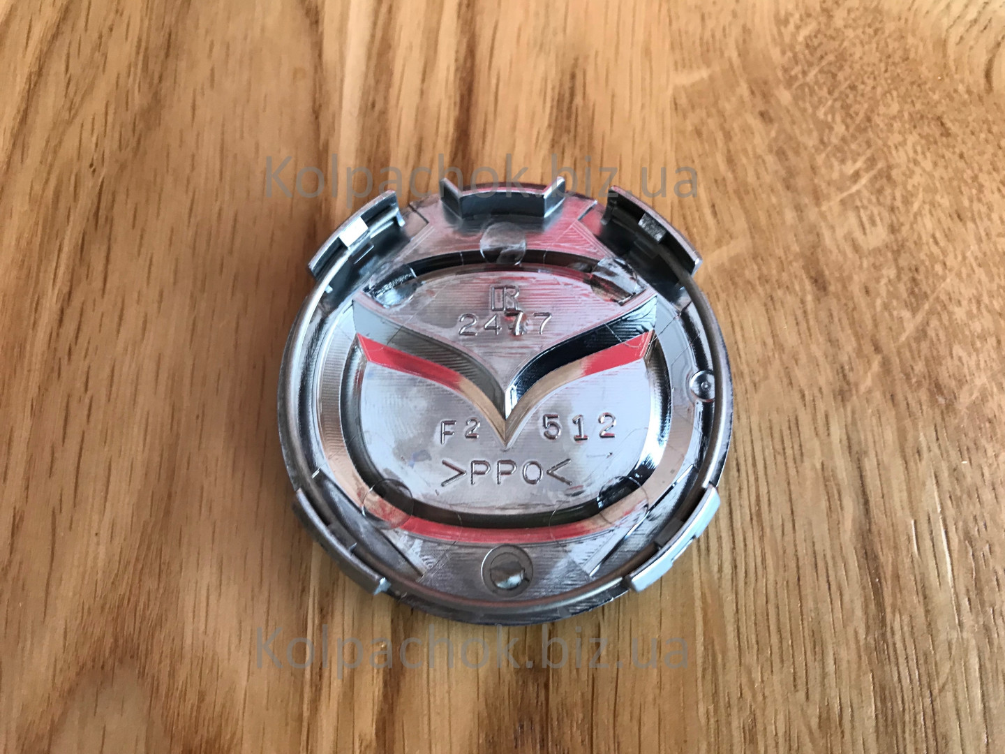 Оригінальний ковпачок для дисків Mazda 2477