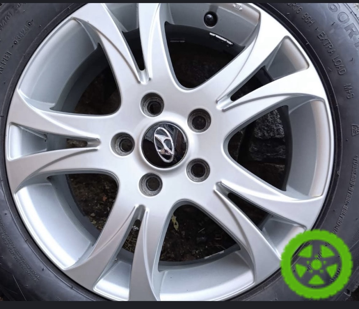 Original center caps with Hyundai logo for rims RADIUS G002