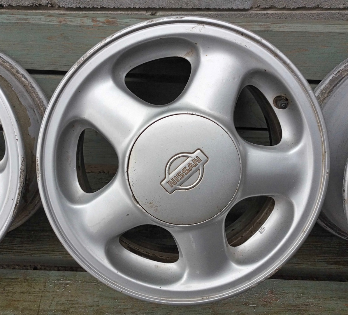 Оригінальний ковпачок для дисків  Nissan 40315-1E010