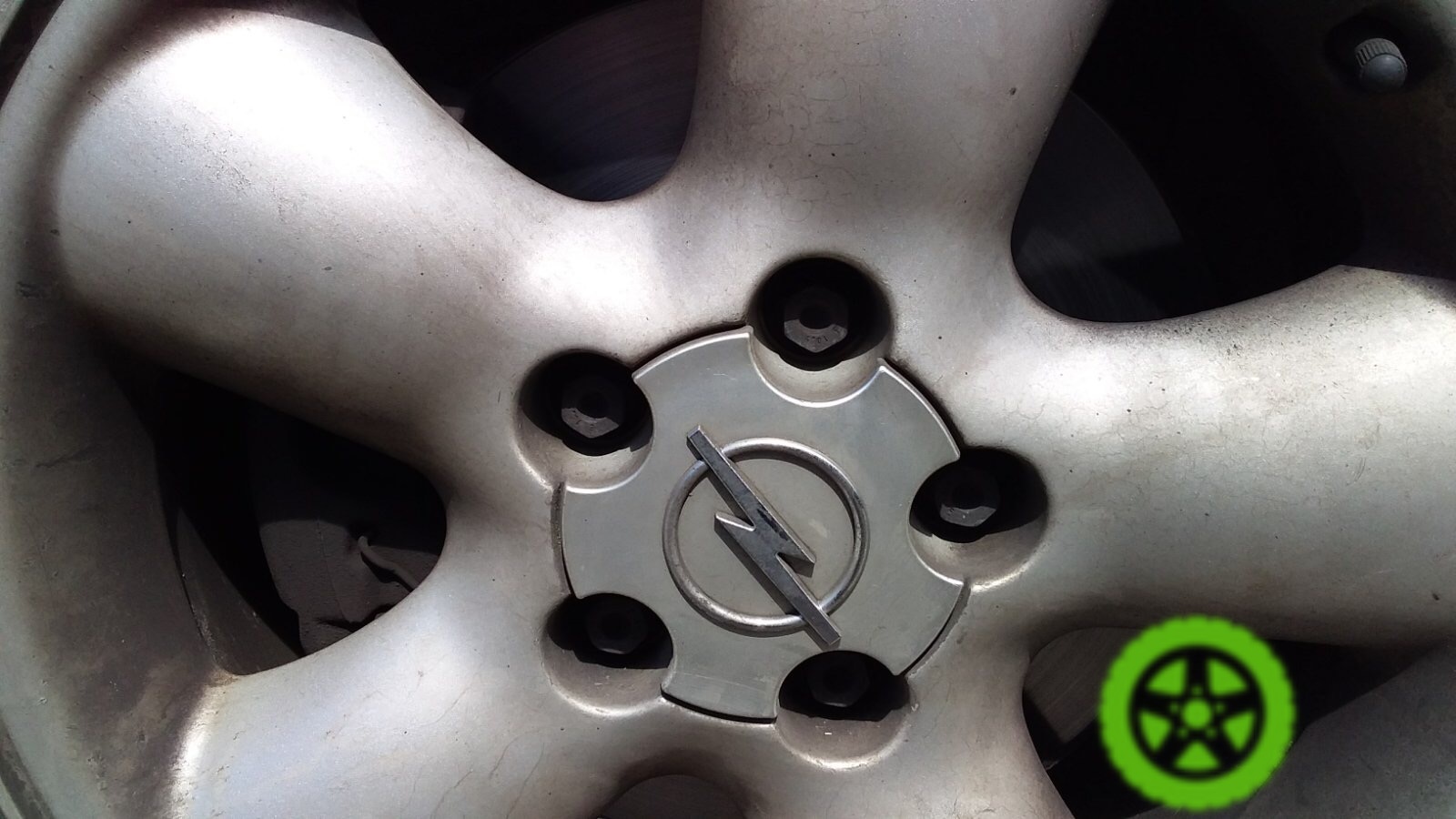 Ковпачок зірка для дисків Opel 90468692