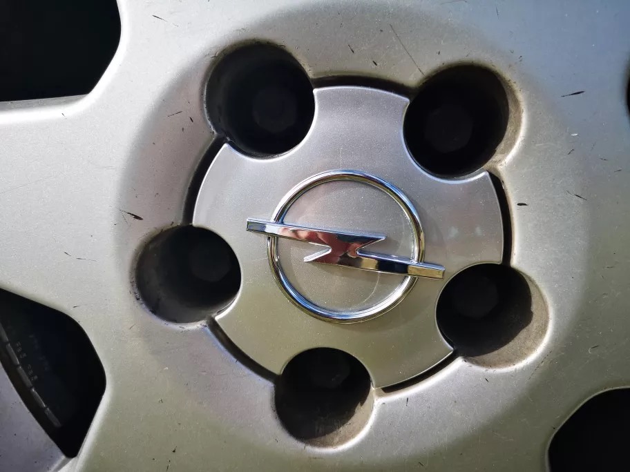 Ковпачок зірка для дисків Opel 90468692