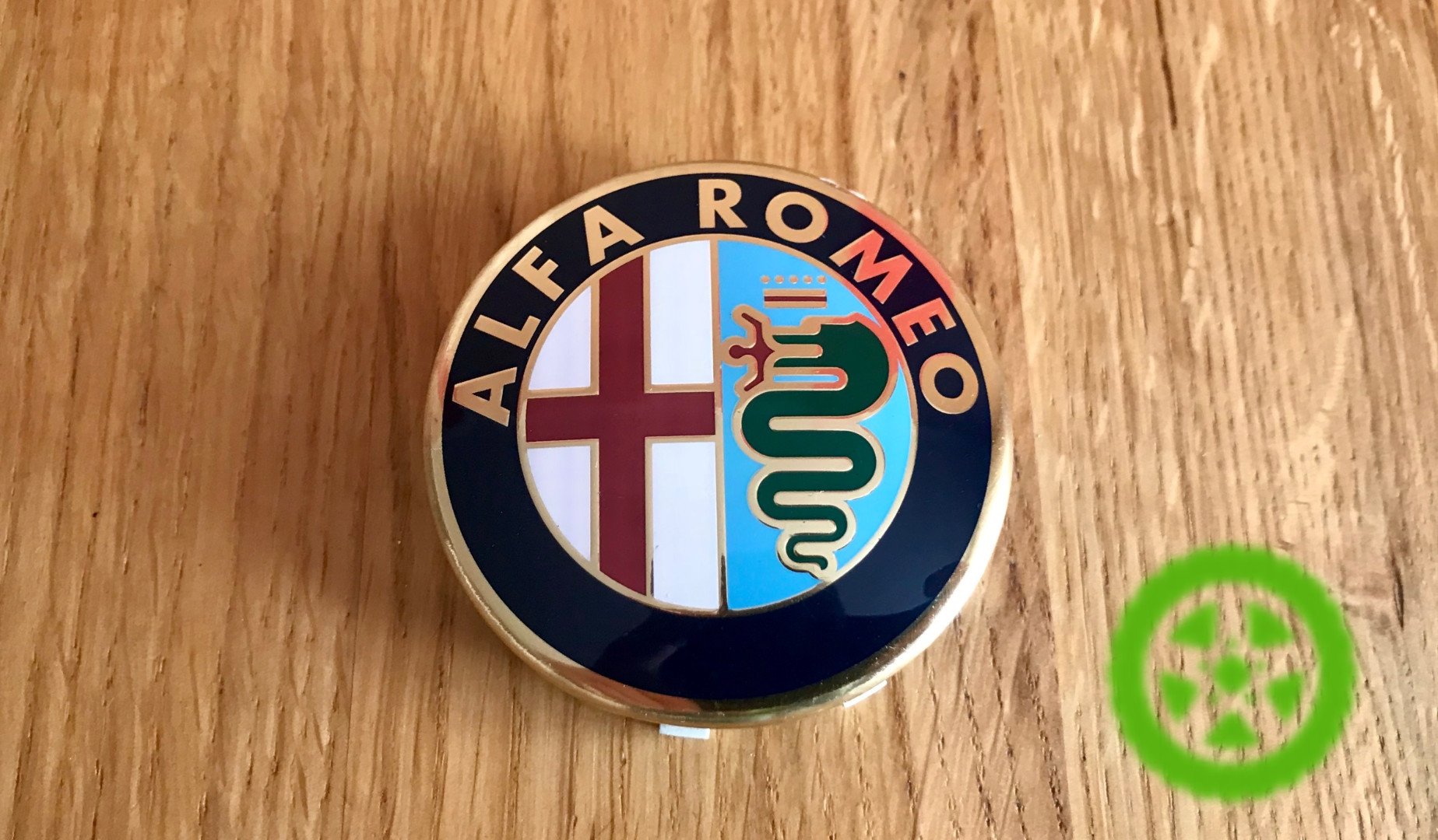 Оригинальный колпачок на диски Alfa Romeo 50501564