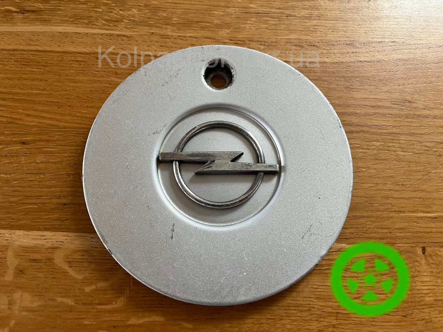 Оригинальный колпачок на  диски Opel 90497227
